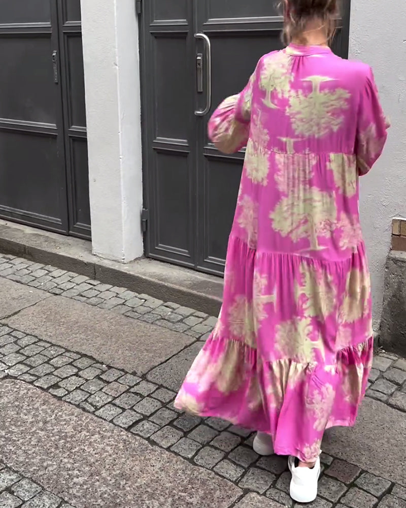 Mette | Lang kjole, V-udskæring, klokkeærmer og blomsterprint