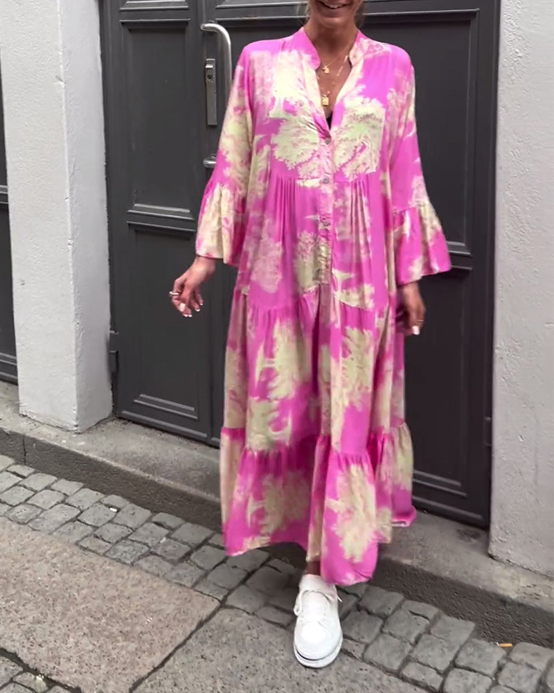 Mette | Lang kjole, V-udskæring, klokkeærmer og blomsterprint