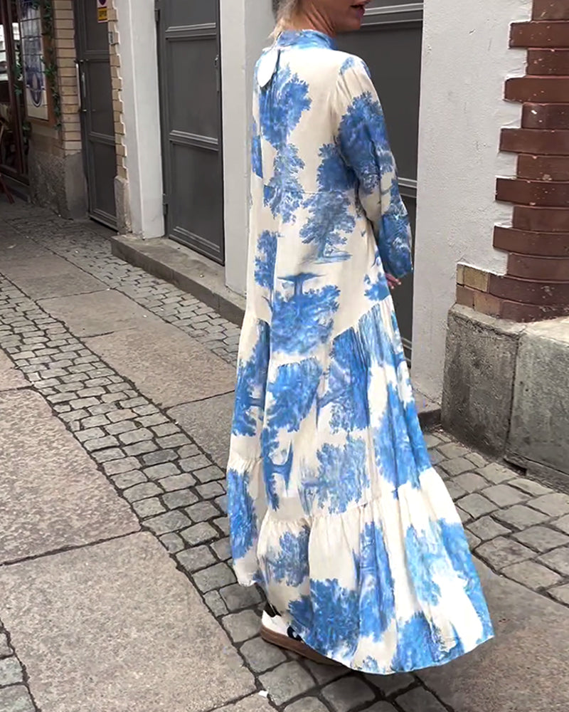 Mette | Lang kjole, V-udskæring, klokkeærmer og blomsterprint