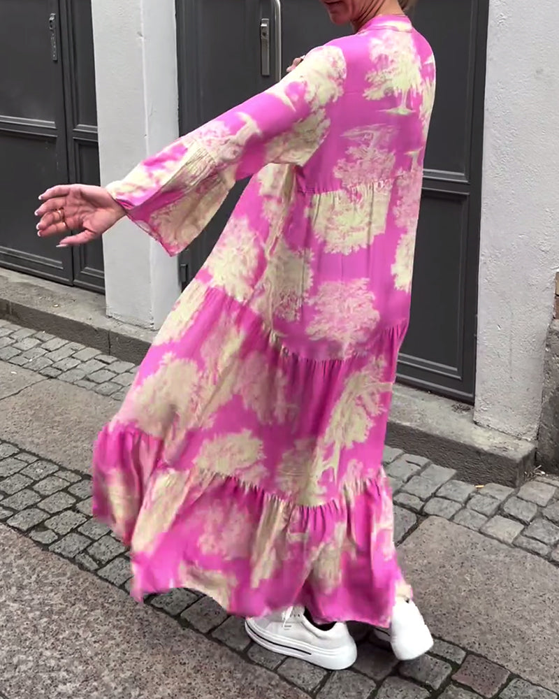 Mette | Lang kjole, V-udskæring, klokkeærmer og blomsterprint
