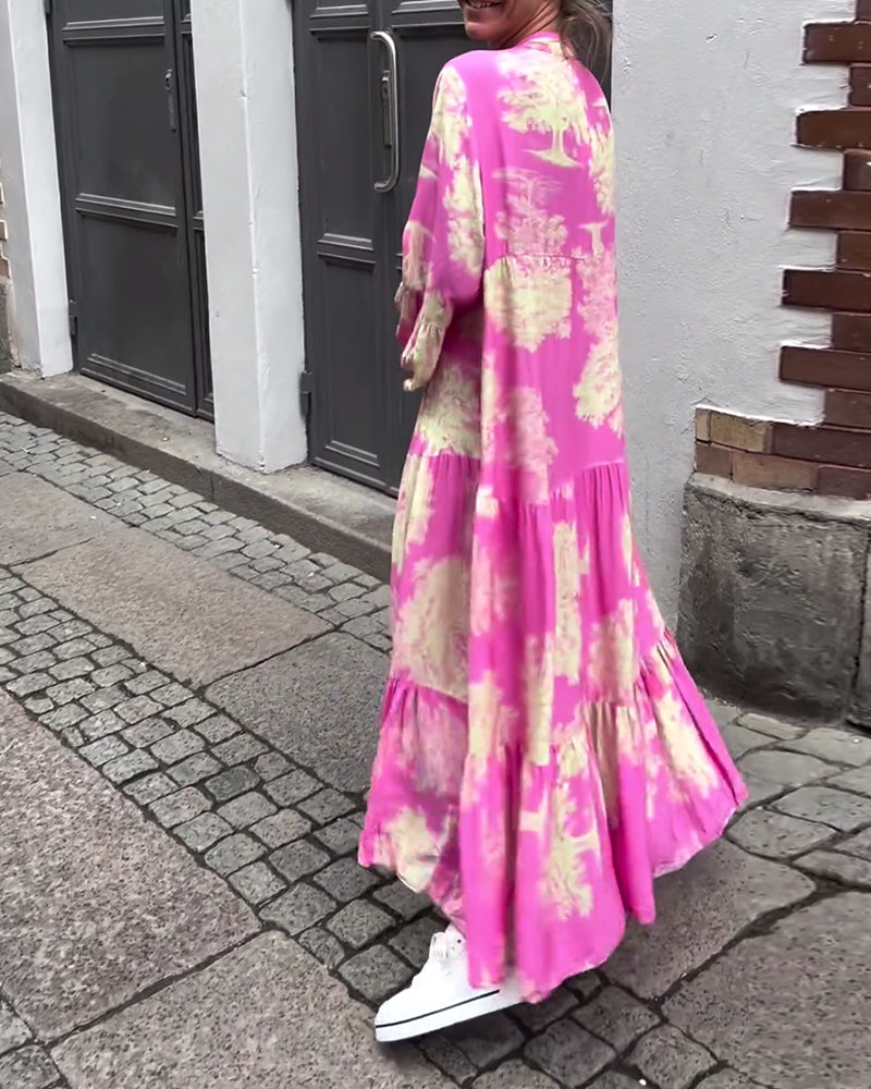 Mette | Lang kjole, V-udskæring, klokkeærmer og blomsterprint