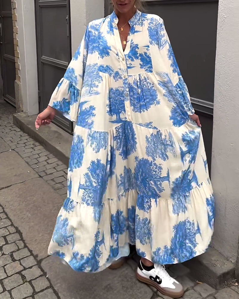 Mette | Lang kjole, V-udskæring, klokkeærmer og blomsterprint