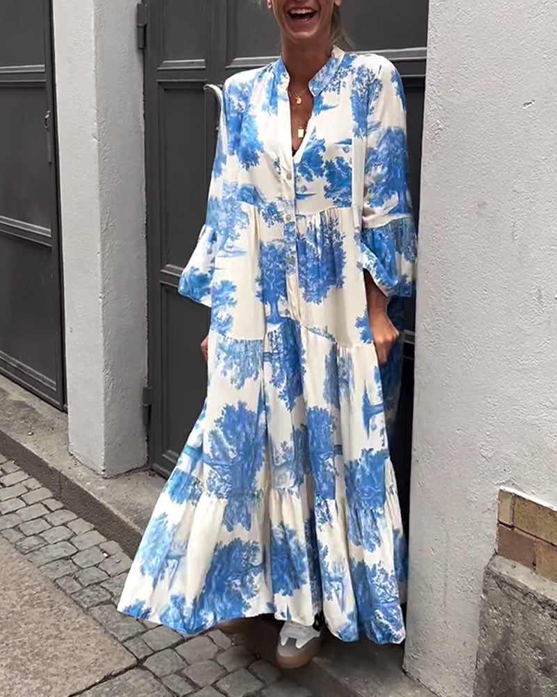 Mette | Lang kjole, V-udskæring, klokkeærmer og blomsterprint