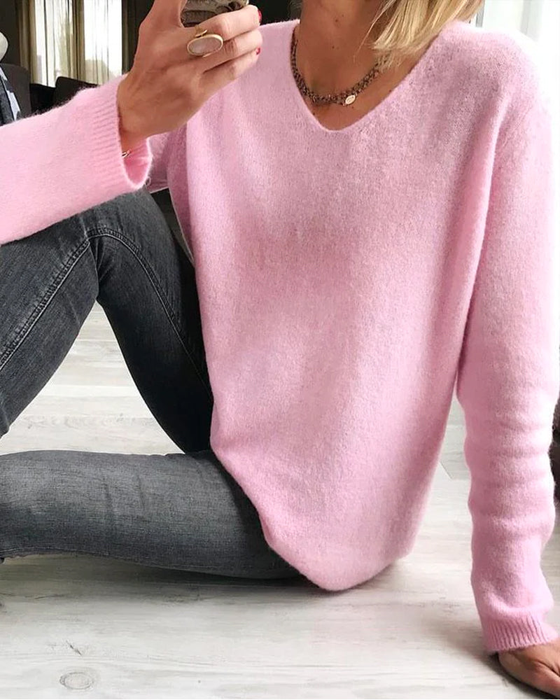 Sweater med V-hals set fra siden
