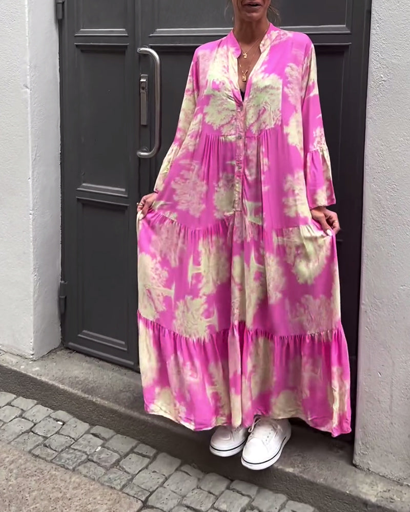 Mette | Lang kjole, V-udskæring, klokkeærmer og blomsterprint