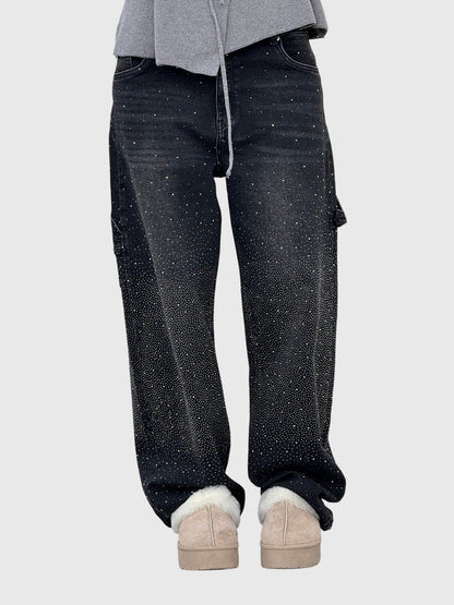 Mønstrede jeans med lige ben set skråt bagfra