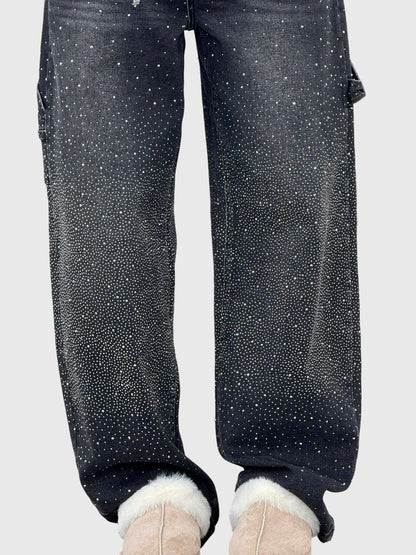 Mønstrede jeans med lige ben set i profil