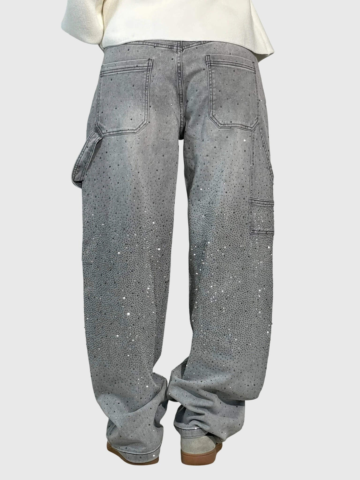 Mønstrede jeans med lige ben lagt frem