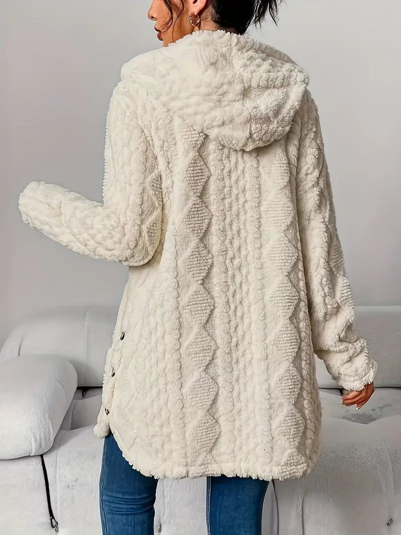 Lang hættecardigan i plys set skråt bagfra