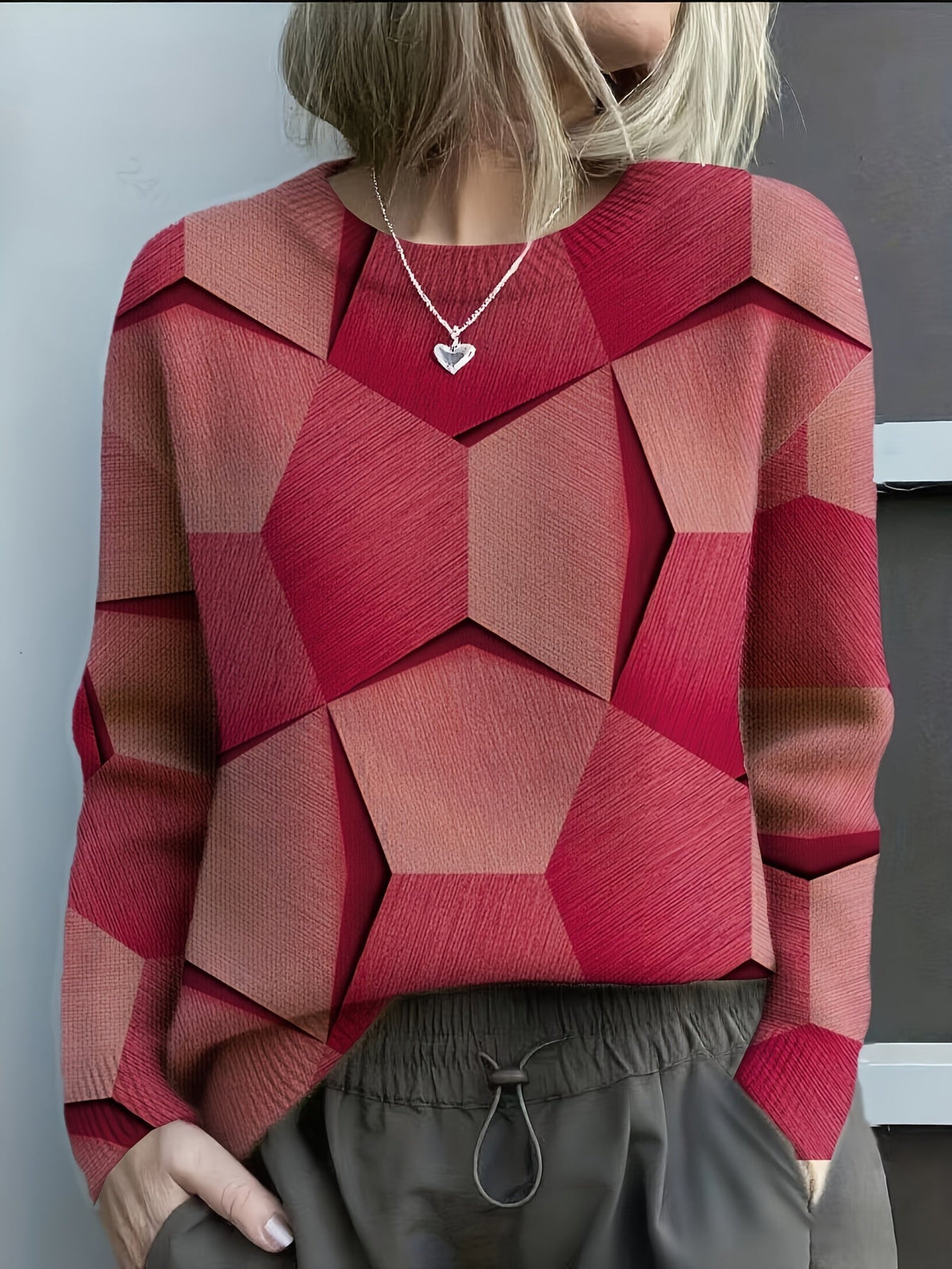 Sweater med grafisk mønster detalje set tæt på