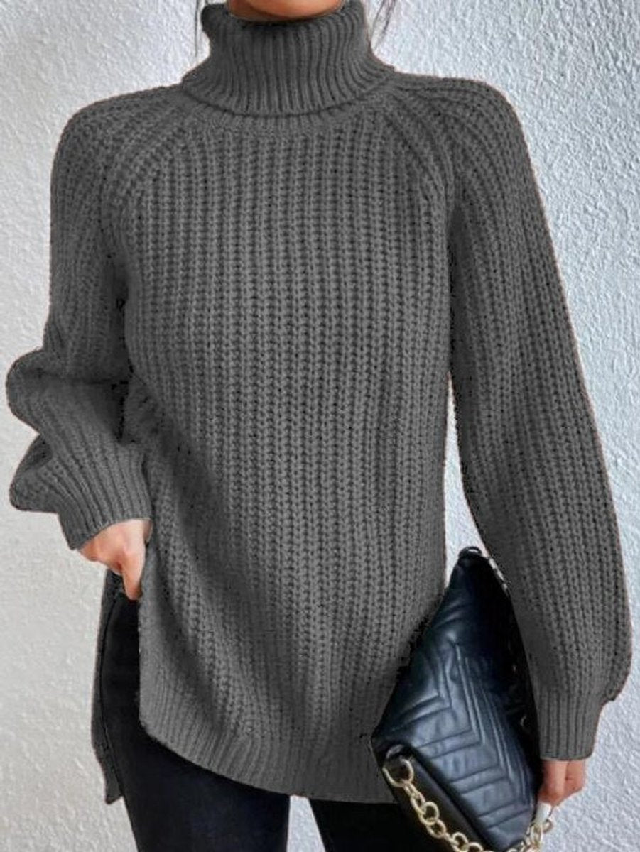Oversize rullekravesweater i grovstrik detalje set tæt på