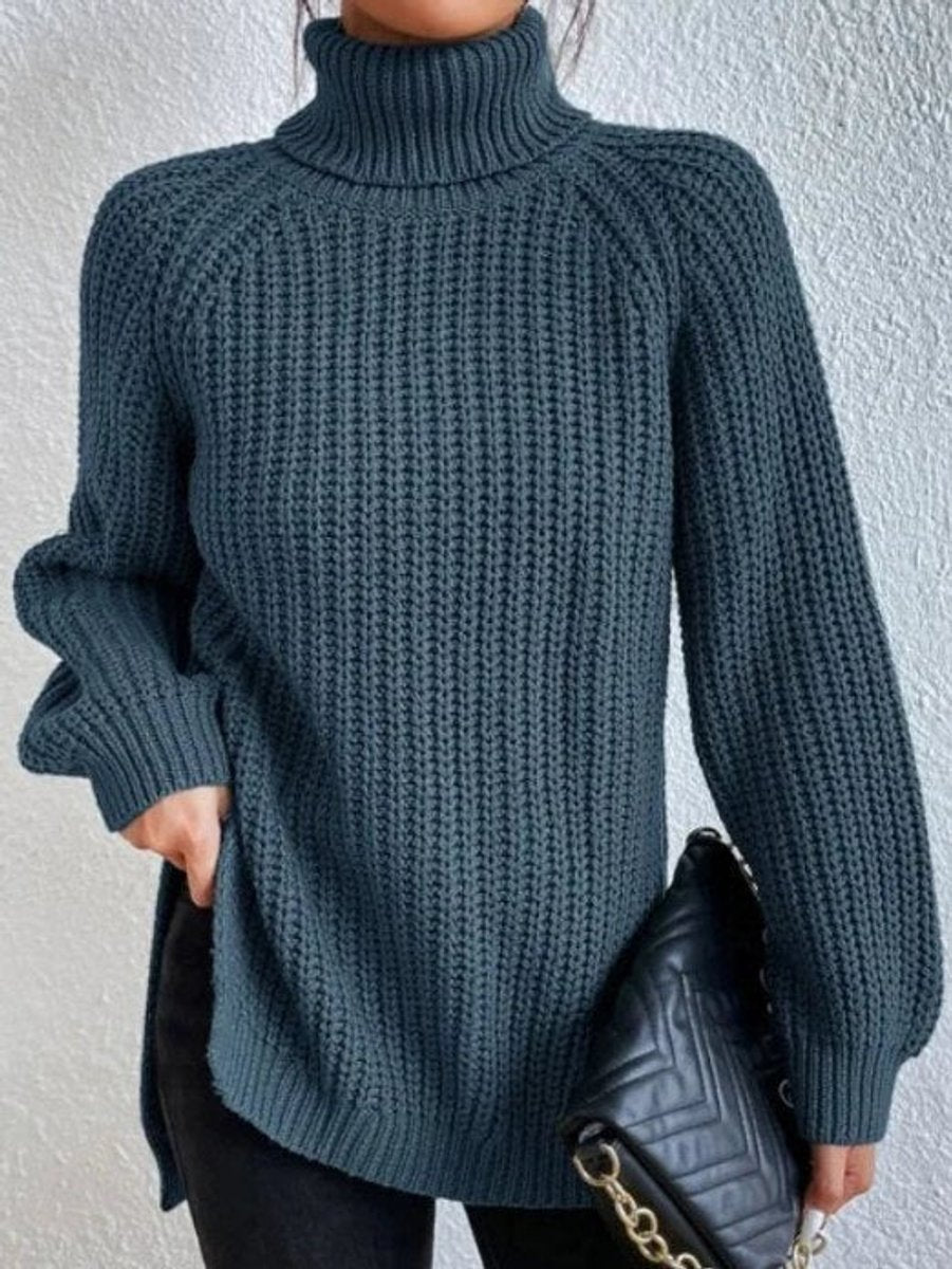 Oversize rullekravesweater i grovstrik nærbillede af stoffet